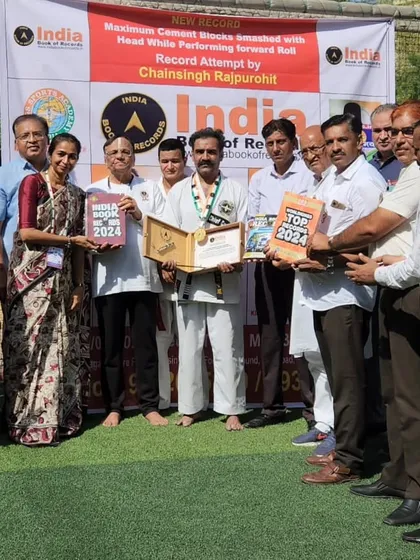 Another moment of pride, receiving the India Book of Records 2024 certificate for smashing the maximum number of cement blocks with my head. This is a result of God's grace and relentless training.
