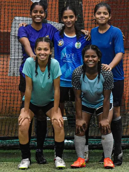 The spirit of the game. Our girls' team after a match, showcasing the unity and friendship forged on the field.