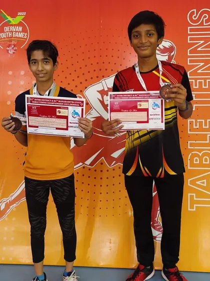 Kavya Bhat and Johan Cheriparambil display their certificates after winning bronze medals at the Maharashtra State Championship in Dervan.