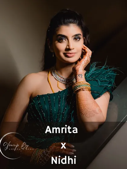 I love creating glamorous looks for receptions and cocktail parties. For Nidhi's big night, we went with a bold smokey eye and nude lip to complement her stunning dark green gown, all brought together with a flawless airbrush finish.