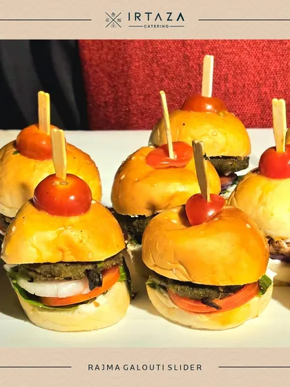 Rajma Galouti Sliders, a vegetarian delight. Soft, melt-in-your-mouth rajma kebabs are placed in mini buns, creating a unique and satisfying appetizer.