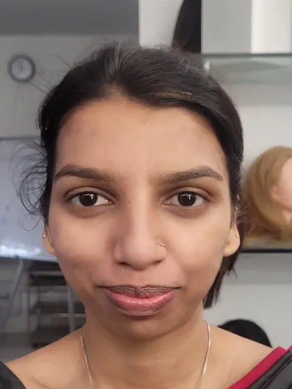 The 'before' image for a traditional makeup session, showing the client's natural features before the application begins.