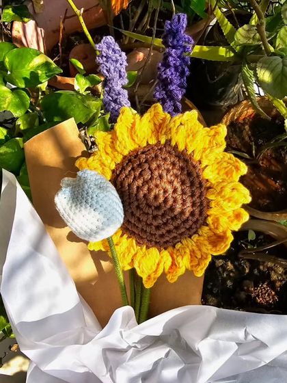 This bouquet, featuring a sunflower, a tulip, and lavender, is a perfect example of a beautiful and budget-friendly gift. I love combining different flowers to create something truly unique.