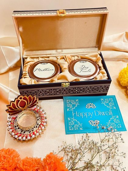 A repeat of our luxurious wooden box with two ornate jars, showcasing its royal appeal for Diwali gifting.