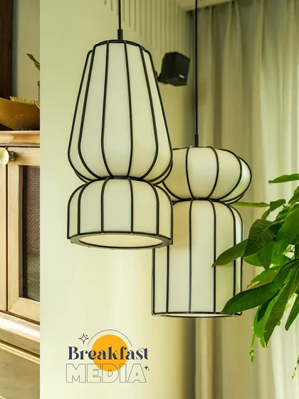 Details matter. This close-up on a pair of modern, sculptural pendant lights from a Studio El Sol project shows my focus on capturing the unique design elements that give a space its character. My lighting techniques ensure that even intricate glass and metalwork are presented clearly.