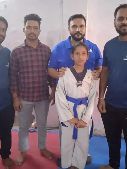 A student with the examiners after her test. We invite senior masters to ensure our evaluations are fair and up to standard.