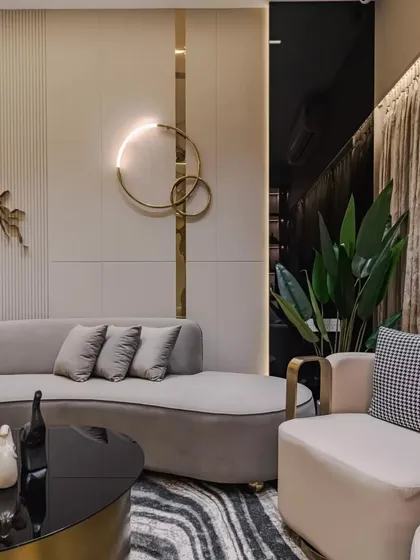 Details in interior design are what transform a space from ordinary to extraordinary. Here, textures, lighting, and thoughtful accents like the interlocking ring wall light create depth, character, and a truly personalized ambiance.