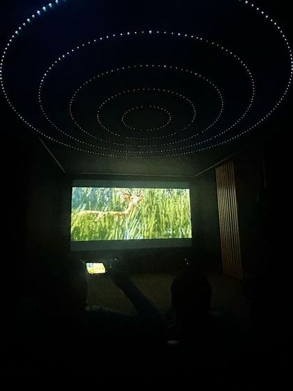 This is a 7.2.4 Dolby Atmos home theater I delivered in just 15 days. The project included full acoustic paneling, custom flooring, and a fiber optic starfield ceiling to create a completely immersive environment.