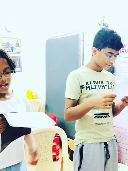 A snapshot from a Western vocal technique class. Students are learning to read music and harmonize, essential skills for any aspiring singer.