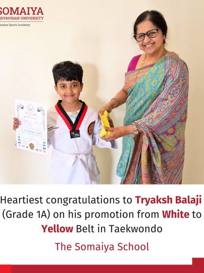 Tryaksh Balaji celebrates his promotion from a White to a Yellow Belt in Taekwondo.