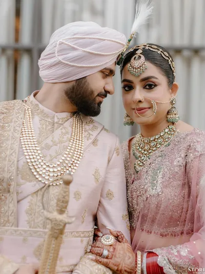 A regal portrait of Sagar and Riya. I focus on the intricate details of the attire and jewelry, ensuring that every element that makes your day special is documented with elegance.