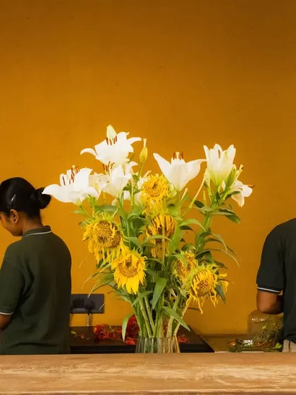 Our team at work, creating the beautiful floral arrangements that you will find throughout the property.