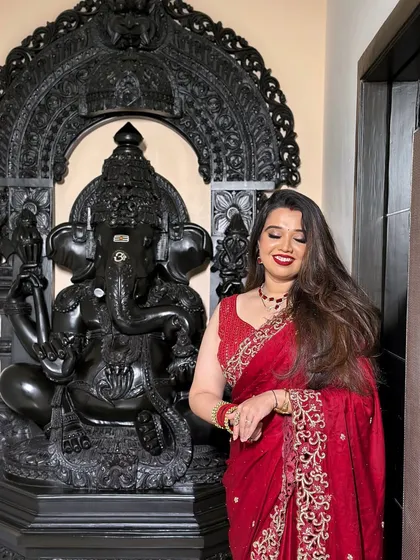A serene and happy moment captured, with the bride's eyes closed.