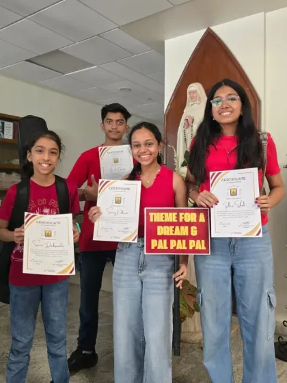 Four of our students proudly hold their certificates after performing a medley of "Theme for a Dream" and "Pal Pal Pal Pal". These fusion performances are a wonderful way to connect with a diverse audience.