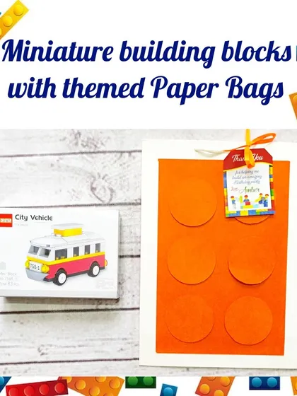 A single building block gift set, showing the miniature city vehicle kit and the matching orange paper bag.