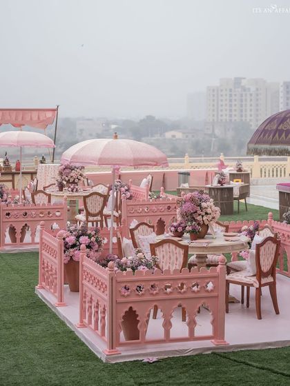 The enclosed seating pods on the lawn provide guests with an intimate space to chat and enjoy the festivities.