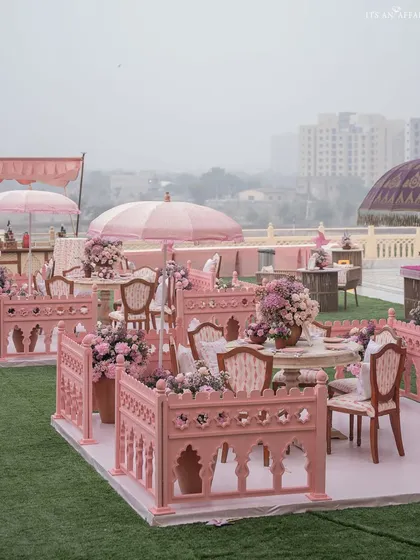 The enclosed seating pods on the lawn provide guests with an intimate space to chat and enjoy the festivities.