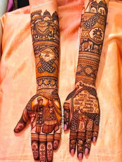 A complex design featuring a mix of portraits, mantras, and traditional patterns.