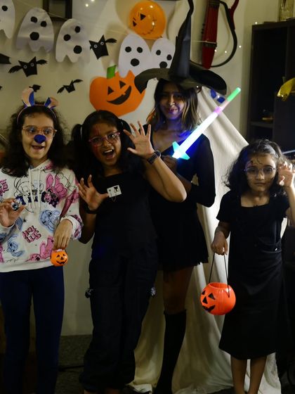 Witches, reindeer, and spooky smiles all around. Our students really got into the spirit for our Halloween party.