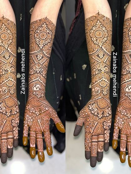 A full bridal design with a unique pattern on the arms.