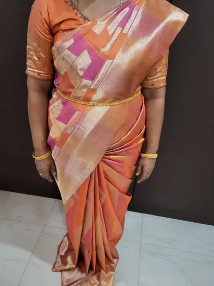 The full view of the drape with structured hip pleats. This technique works beautifully on silk sarees to create a defined waistline.