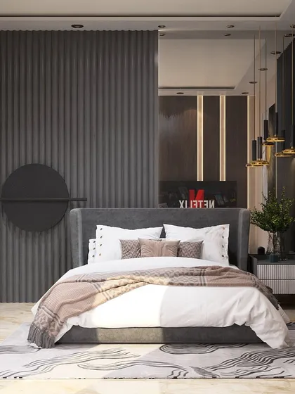 For lovers of a moody aesthetic, this bedroom showcases the elegance of grey. We used fluted wall panels, a dark upholstered bed, and dramatic pendant lighting to create a sophisticated and modern sanctuary.