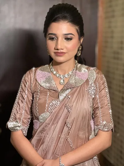 A final portrait of the bride, looking poised and elegant.