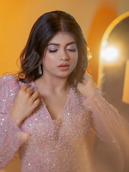 A close-up of the eye makeup, featuring a beautiful blend of pink and blue pastel shades.