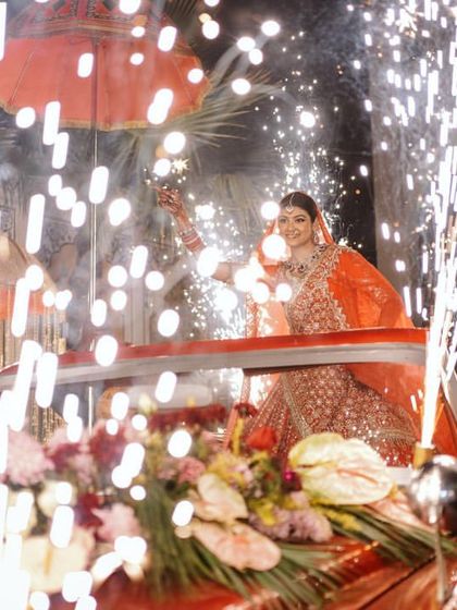 Another angle of the bride's dazzling entry, showcasing the scale of the pyrotechnics and the sheer glamour of the moment. I plan for visual impact from every viewpoint.