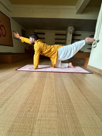 Proper form is key to receiving the full benefits of any asana. Here I demonstrate the full extension in the Balancing Table Pose, which engages the entire body and supports a healthy metabolism.