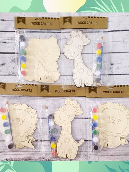 Here are the individual woodcraft art kits, featuring a tiger, giraffe, and lion. Each kit comes with paints and a brush for a fun, creative activity.