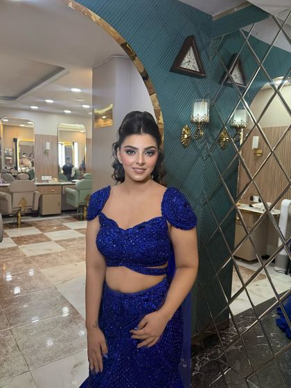 This client is ready for her grand entrance. The makeup is bold and confident, just like her.