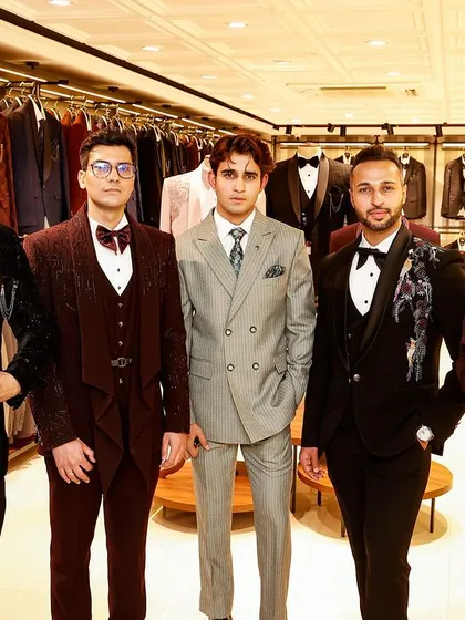 Suits for every occasion. Our team of models showcases a variety of suits and tuxedos, from double-breasted to patterned velvet, all available and tailored in our stores.