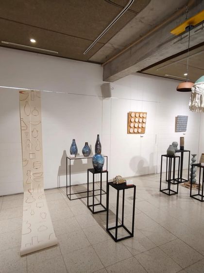 Some beautiful corners from our recent showcase. It was so wonderful to see everyone's hard work displayed together, from sculptural vases and lamps to wall art.