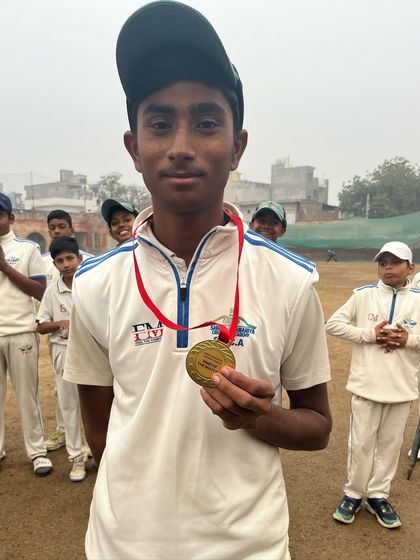 Our talented leg spinner, Ashish Kumar Jha, with his Man of the Match medal.