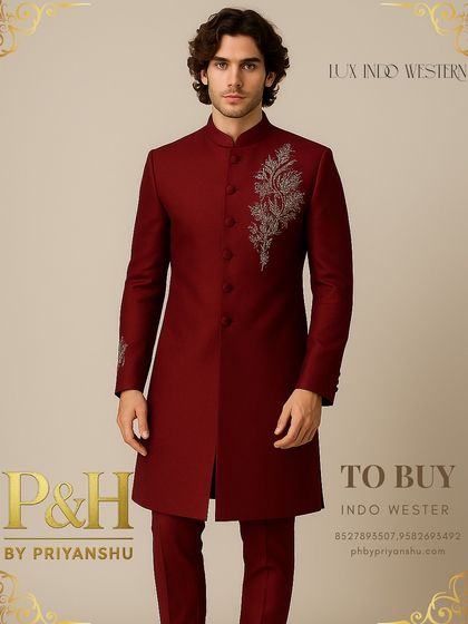A portrait view of the maroon silk Indo-Western suit, highlighting the intricate, handcrafted embroidery that makes each piece a unique statement of style.