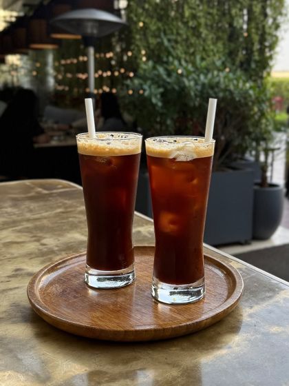 Fueling up, one sip at a time. Our Iced Americanos are the perfect way to get your caffeine fix on a warm day.