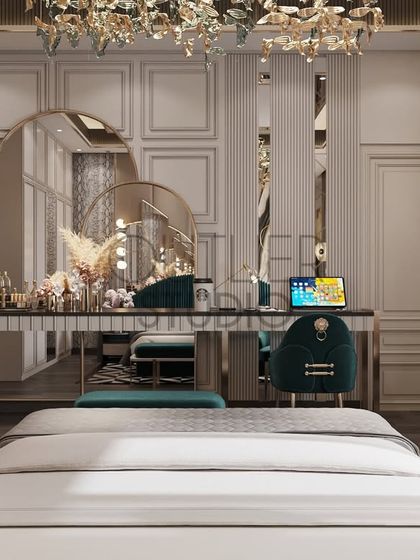 A look at the elegant and functional dressing-cum-study unit in the daughter's bedroom. The design features a large triple-arched mirror, a sleek desk, and a plush velvet chair, combining practicality with glamour.