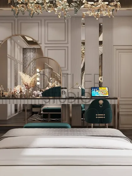 A look at the elegant and functional dressing-cum-study unit in the daughter's bedroom. The design features a large triple-arched mirror, a sleek desk, and a plush velvet chair, combining practicality with glamour.