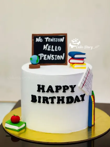 'No Tension, Hello Pension'. A fun retirement cake for a teacher, decorated with a mini blackboard, books, and an apple.