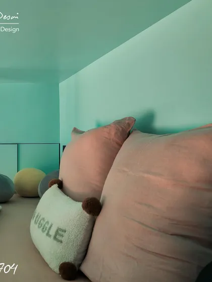 A close-up of the pillows and cushions in the loft area of Project 704. Even the small details are chosen to create a comfortable, inviting, and fun space for kids to hang out.