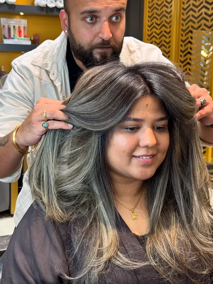 A final look at this gorgeous ash blond transformation, full of dimension and style.