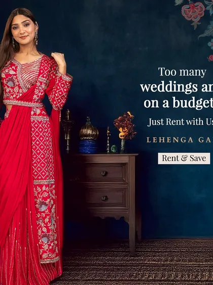 Too many weddings and on a budget? Just rent with us. This stunning red pre-draped saree with a beautifully embroidered jacket-style blouse is the perfect solution.