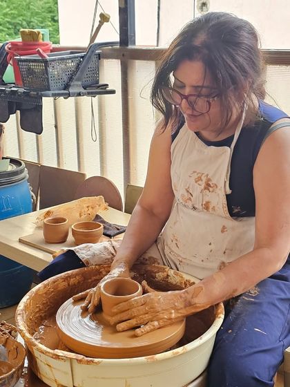 A student enjoying her time at the wheel during a one-day workshop. It's a great way to de-stress and do something different.