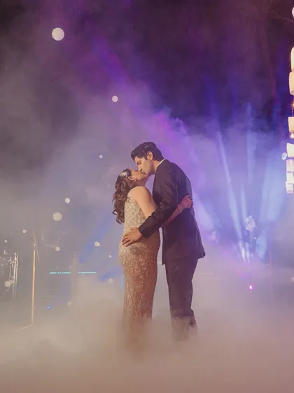 The first dance as husband and wife. We set the stage for this magical moment with ethereal low-lying fog and dramatic spotlights, creating a dreamy, cloud-like effect that made it feel as if the couple were the only two people in the world.