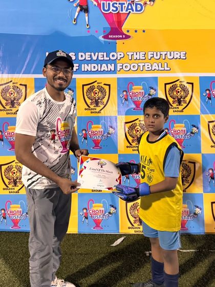 A young player receives a certificate of appreciation at a Chote Ustad event. We believe in recognizing effort and encouraging every child.