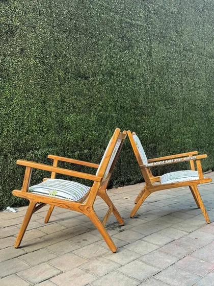 Side profile of the X-frame easy chairs.