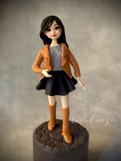 I love the challenge of creating realistic clothing and expressions, like on this modern girl figurine.