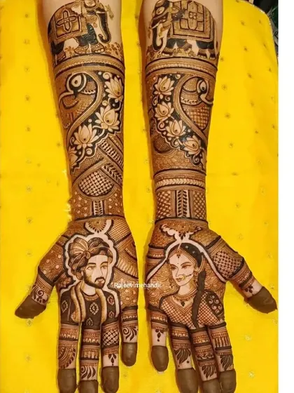 A beautiful portrait of a Sikh couple on the palms, with traditional floral and elephant motifs on the arms.