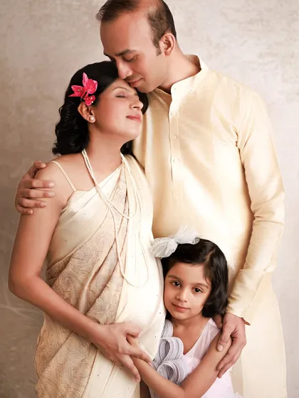 Celebrating the journey to motherhood is so special, especially when a big sister is waiting to meet her new sibling. This maternity session captures the love and anticipation of a growing family.